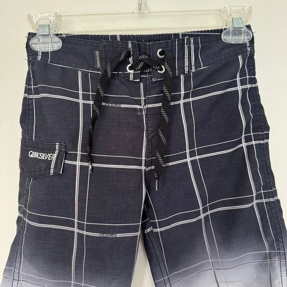 Quiksilver Board Shorts Featuring a Black and White Plaid Design